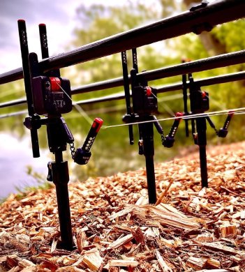 JAG Prolite Black Bank sticks with bite alarms at lake edge