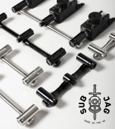 Flat lay of SUB x JAG buzz bar elements in Prolite Black & 316 Stainless